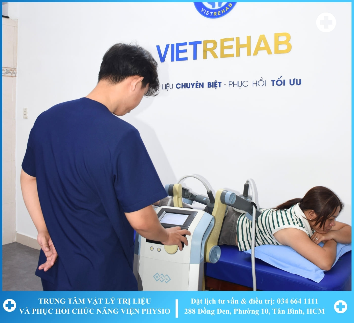 A therapist working with a patient on a rehabilitation machine with greenery in the background