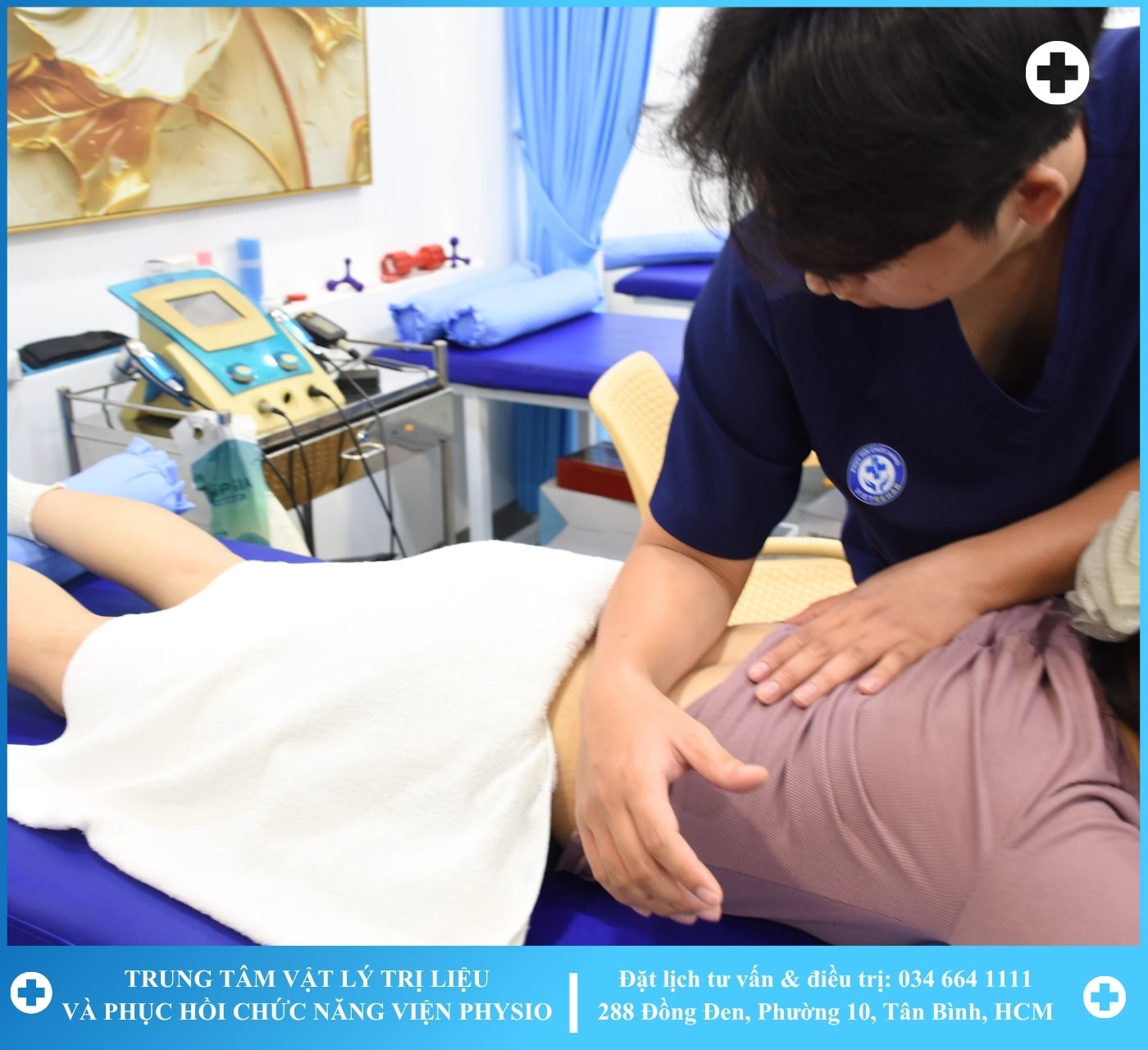 A therapist working with a patient on a rehabilitation machine with greenery in the background