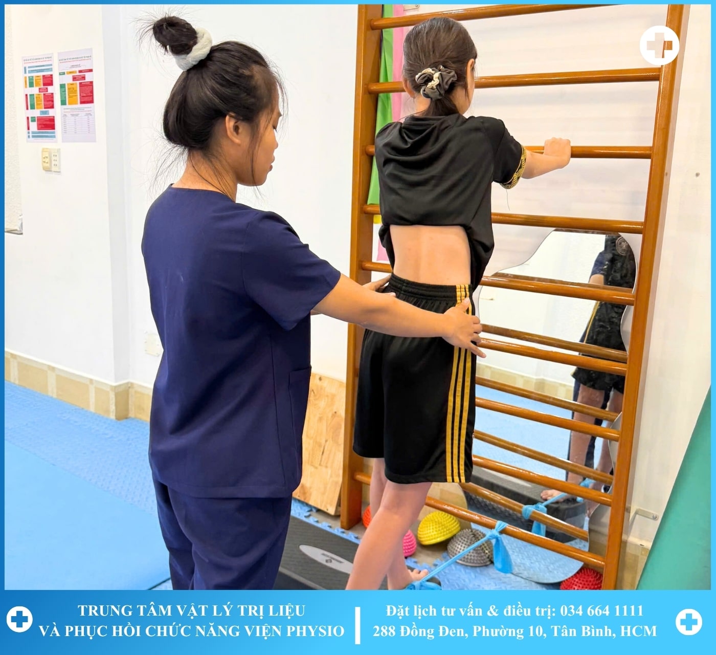 A therapist working with a patient on a rehabilitation machine with greenery in the background